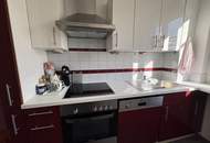 Ruhige 2-Zimmer Wohnung mit Grünblick, Terrasse und 2 Garagenplätzen