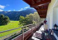 Schlitters: Kernsanierte Dachgeschosswohnung mit Südbalkon, Garten und traumhafter Aussicht