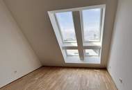 Erstbezug! Schöne Dachgeschosswohnung mit Terrasse
