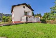Zweifamilienhaus mit Garten und Doppelgarage, vollunterkellert – über 350m² Gesamtfläche!