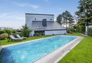 Blickfang mit Privatsphäre! Außergewöhnliches Designerhaus mit viel Raum zur Entfaltung | 9 Zimmer, Edelstahlpool, Sauna, Weinkeller | Vereint Wohnen und Arbeiten | Barrierefrei