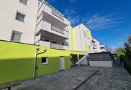 Sofort beziehbar! Neubauwohnung mit neuer Küche, 10m2 Balkon, Parkplatz und Grünblick - Fernwärme