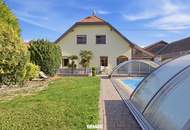 Energieeffizientes, großzügiges Einfamilienhaus mit Pool, sonnigem Garten und beheiztem Wintergarten!