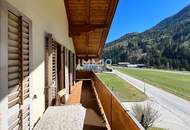 Wohnhaus und vier Bauparzellen