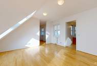 Helle Dachgeschosswohnung mit Terrassen und Blick auf die Karlskirche