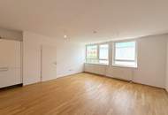 Hofseitig orientierte Zwei-Zimmer-Wohnung mit Einbauküche