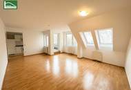 Helle Dachgeschosswohnung mit Top-Anbindung – urban wohnen mit Rückzug in den Innenhof - Nähe U4/U6