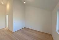 Modernes Plus-Energie-Reihenhaus in Massivholzbauweise