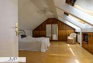 Großzügige DG Wohnung mit 2 ruhigen Südterrassen in zentraler Lage