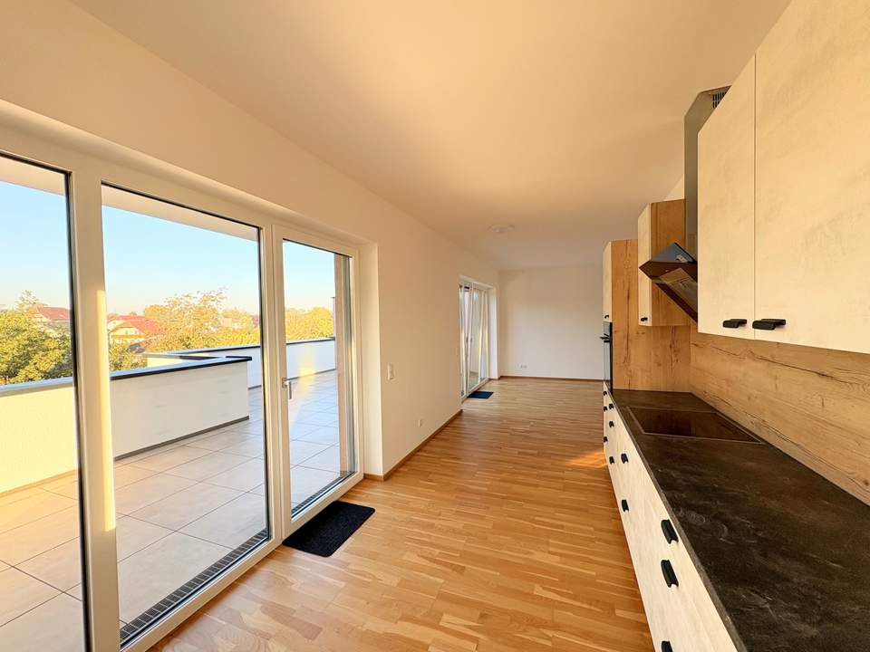 Penthouse-Feeling mit 70 m² Dachterrasse, Lift & überdachtem KFZ-Stellplatz