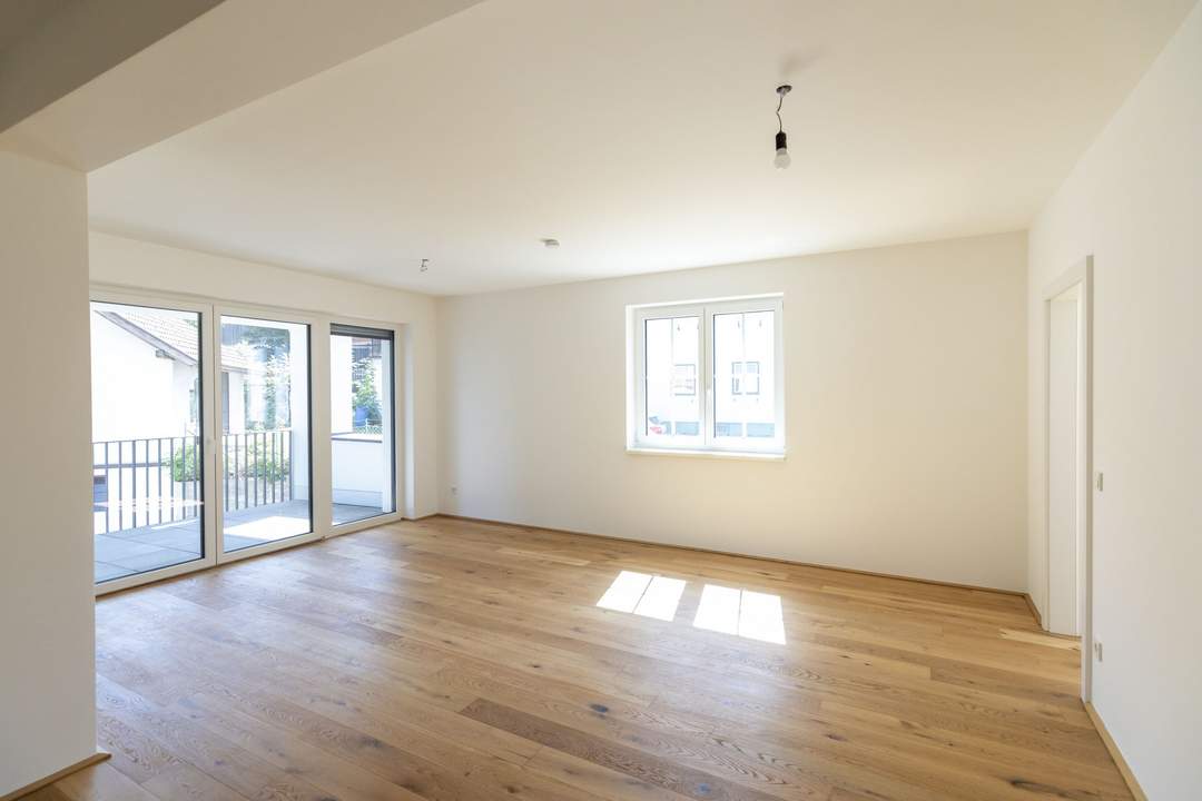 Großzügigie Wohnung im Ortszentrum - TG-Stellplatz inklusive