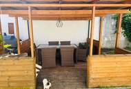 Einfamilienhaus mit Garage &amp; Wintergarten in Ortsrandlage