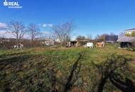 Rarität am Kirchberg – Exklusives Baugrundstück mit unverbaubarem Seeblick