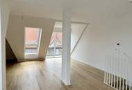 Eleganz trifft Lage – Neubau-Dachgeschosswohnung in Toplage