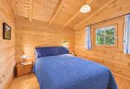 Sonnberg - Ruheoase mit Bergblick: Blockhaus auf 660m² Bauland in Finkenstein am Faaker See