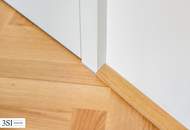 Stilvolles Wohnen mit Balkon über den Dächern der Stadt