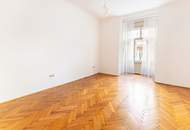 Altbau-Charme mit 3 Zimmern und Süd-Balkon in zentraler Lage