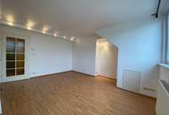Elegante Dachgeschosswohnung im Botschaftsviertel – beim Belvedere, mit Hofruhelage