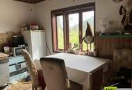 7,6 % Rendite – vermietete Doppelhaushälfte mit zusätzlicher Wohneinheit zur Renovierung und Selbstnutzung.