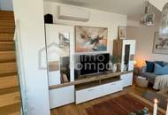 Dachgeschossmaisonette mit einer Traumterrasse und vollmöblierter Küche