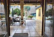 GROSSZÜGIGES EINFAMILIENHAUS MIT TRAUMHAFTEM GARTEN