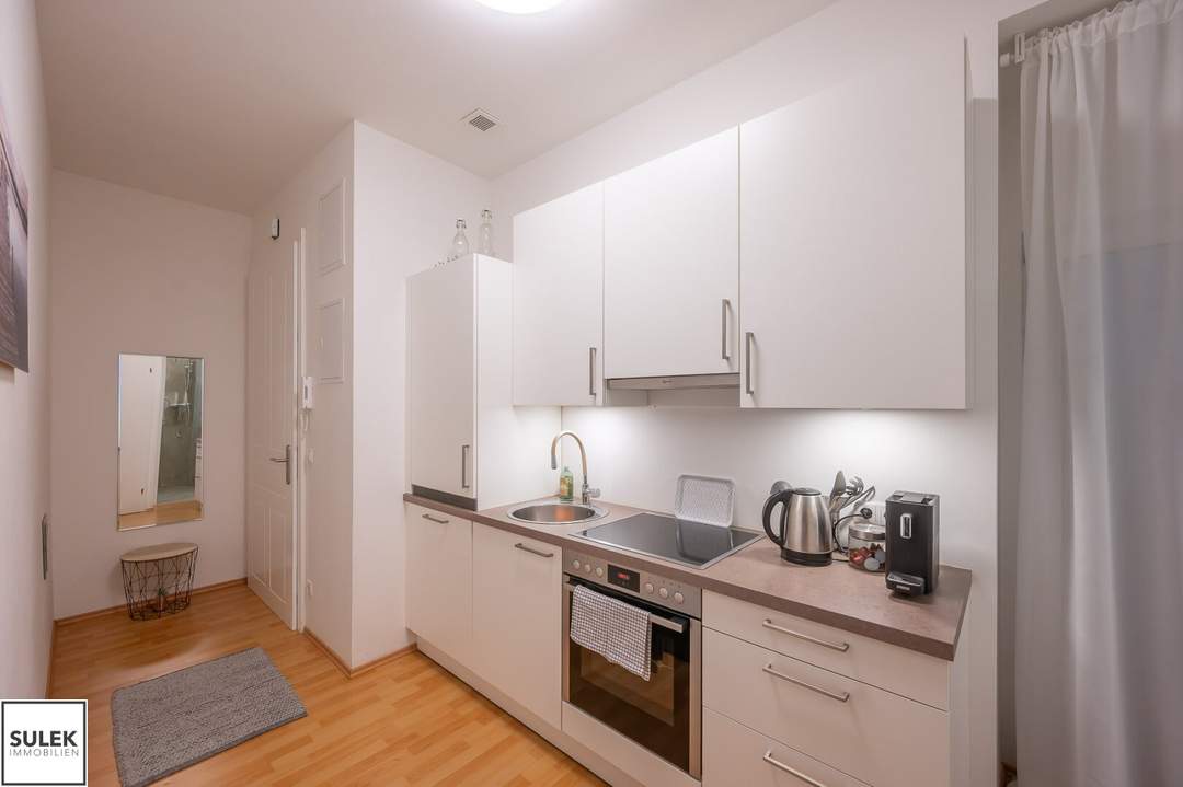 Bis 31.7.27 befristet vermietete, hofseitige EG-Wohnung mit Garten/Terrasse