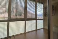 Großzügige Eigentumswohnung mit Balkon, Wintergarten, Gartenanteil und Garagenparkplatz in St. Gertraud