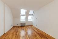 Altbau trifft Moderne – Wohnen über den Dächern