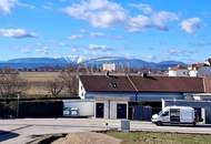 Dachgeschosswohnung in Niedrigenergiebauweise und 23m² Terrasse mit spektakulärem Fernblick.
