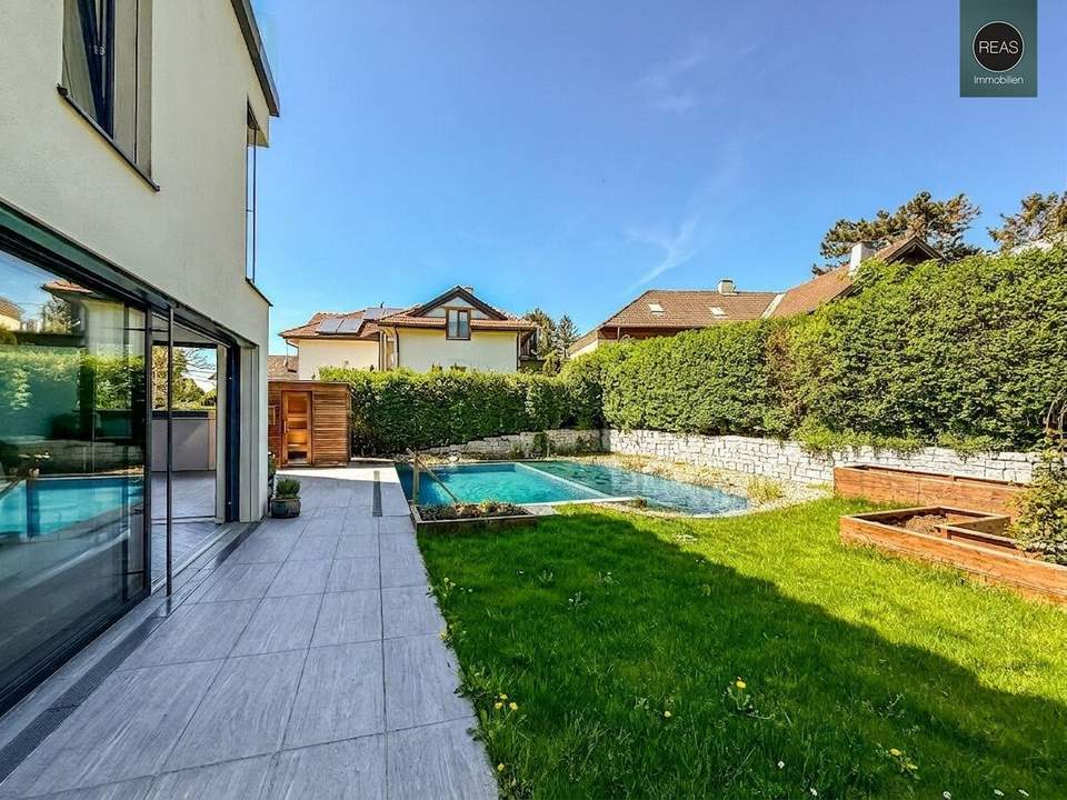 Hochwertig ausgestattete Luxusvilla mit Naturpool am Wolfersberg!