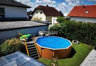 Moderne Doppelhaushälfte mit Pool, Garage und Garten