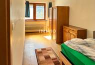 Wohnhaus und vier Bauparzellen