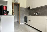 Familienfreundliche 4-Zimmer-Wohnung mit Balkon und Garagenplatz