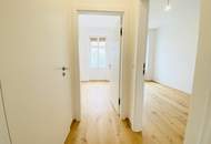 Exklusiver Erstbezug nach Sanierung - 3-Zimmerwohnung mit Freifläche in den ruhigen Innenhof