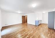 Neubauwohnung mit Süd-Balkon in ruhigen Innenhof und Garage | Einbauküche | U-Bahn- und Donauinselnähe