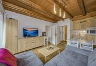 Dachgeschosswohnung an der Skipiste mit Kaiserblick
