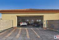 Stilvolle Villa mit gepflegtem Garten und großzügiger Garage