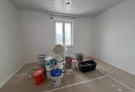 Traumhafte 4-Zimmer Wohnung mit Garten und ausbaubarem Dachgeschoss