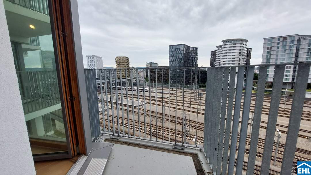 Sonnwendviertel: 1-Zimmer-Wohnung mit Balkon im 17. OG – Fitnessraum, Co-Working &amp; Rooftop-Terrasse inklusive!