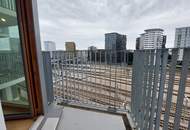 Sonnwendviertel: 1-Zimmer-Wohnung mit Balkon im 17. OG – Fitnessraum, Co-Working &amp; Rooftop-Terrasse inklusive!