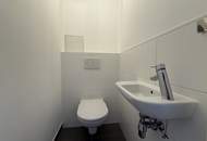 Wohnen am Wasser | Zwei-Zimmer-Wohnung mit Einbauküche und direktem Wasserblick