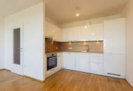 Wohnen am Wasser | Zwei-Zimmer-Wohnung mit Einbauküche und direktem Wasserblick