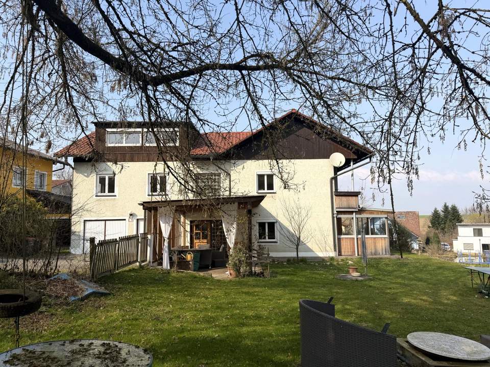 Mehrfamilienhaus mit kompaktem Garten