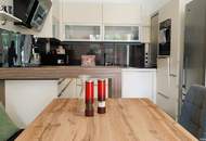 Miete. Neuwertige Wohnung mit Terrasse und Garten in Seeboden. Tiefgarage.
