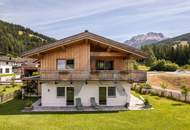 Traditionelles Einfamilienhaus mit Bergblick