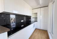 ENERGIEEFFIZIENTE MÖBLIERTE FAMILIENWOHNUNG MIT TERRASSE UND PARKPLATZ