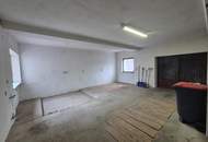 Mehrfamilienhaus mit Geschäftslokal