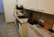 Zwei-Zimmer-Wohnung in renoviertem Altbau mit attraktiver Außenfläche!