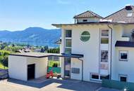 Miete. Neuwertige Wohnung mit Terrasse und Garten in Seeboden. Tiefgarage.
