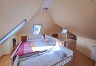 Außergewöhnliche Haushälfte vor den Toren Wiens mit enormem Potential